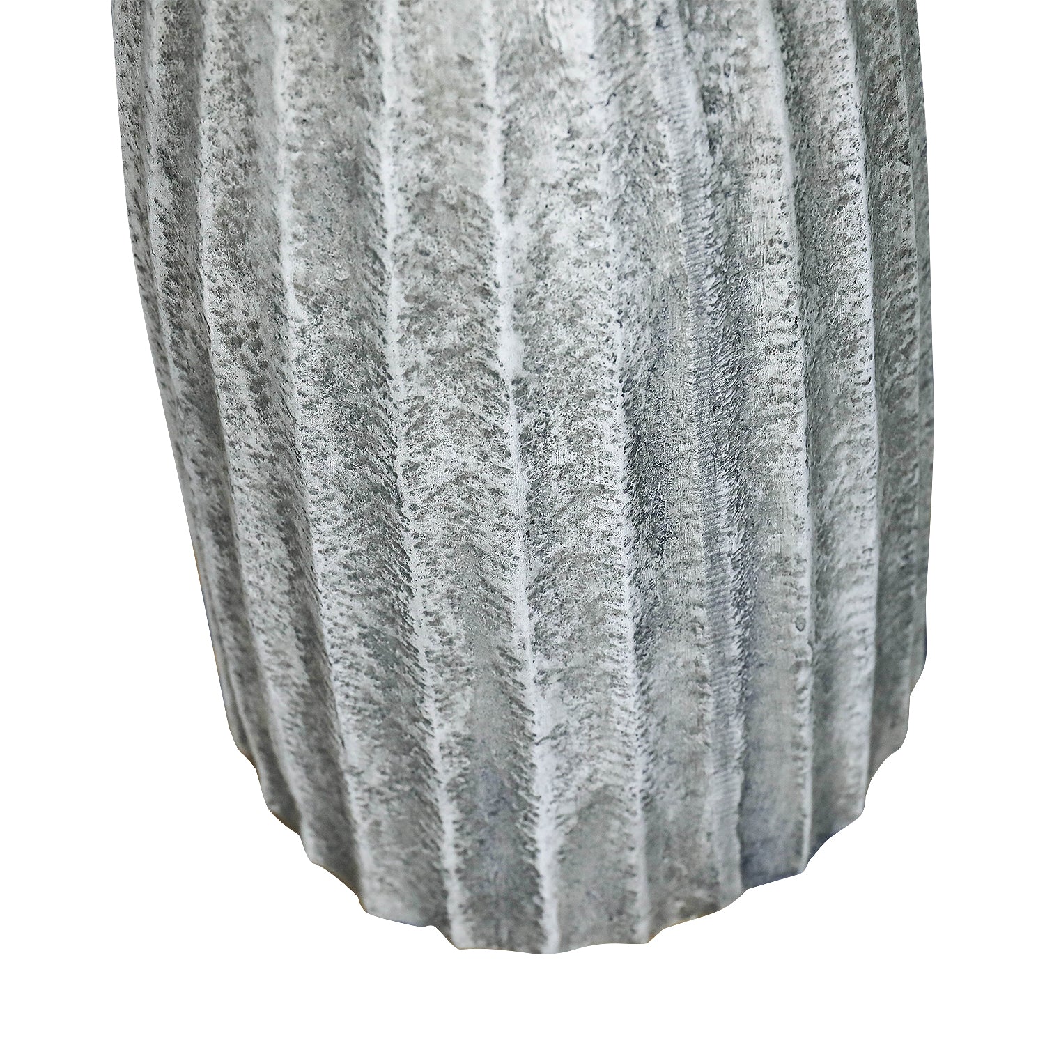 Close-up of vertical fluted concrete column pedestal showing texture detail