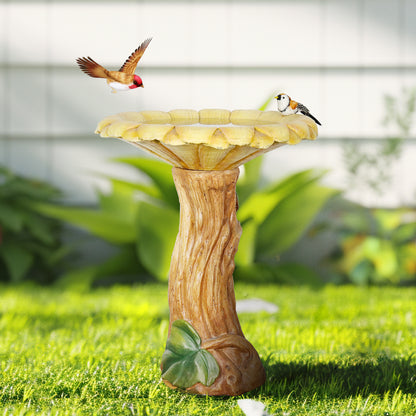24.4"H concrete sunflower bird bath acting as a charming centerpiece on a green garden lawn