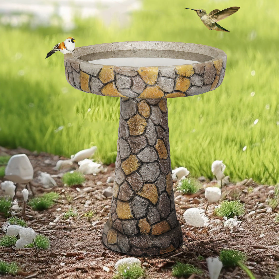 24" tall mosaic stone design concrete birdbath in a vibrant garden