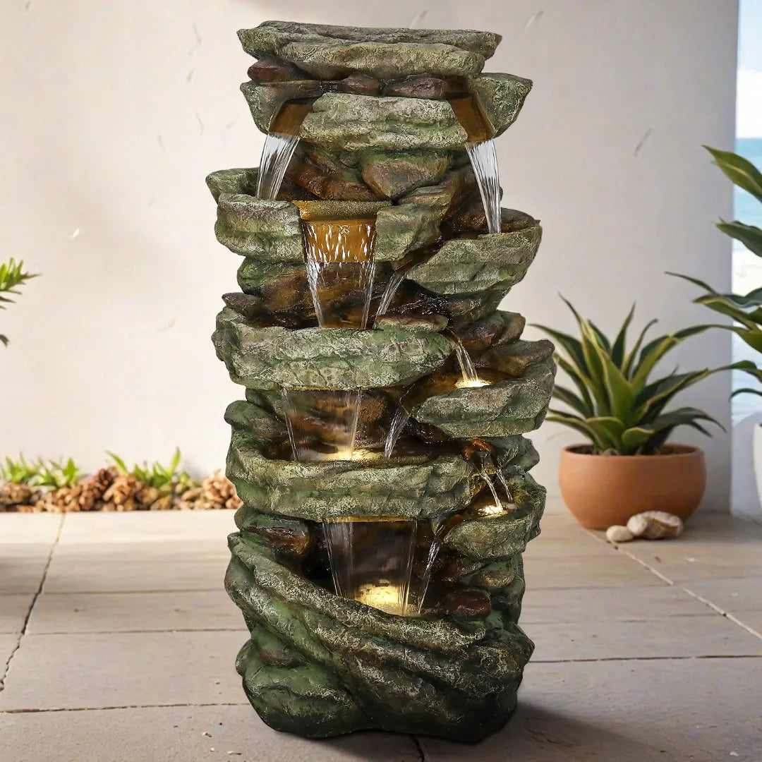 Resin Stacked Stone Rock Waterfall Outdoor Fountain in garden setting