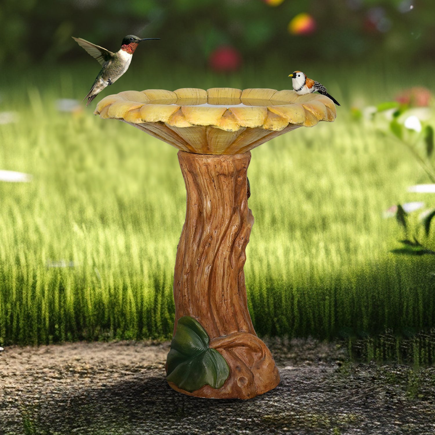 Birds enjoying fresh water in the whimsical sunflower-shaped outdoor bird bath