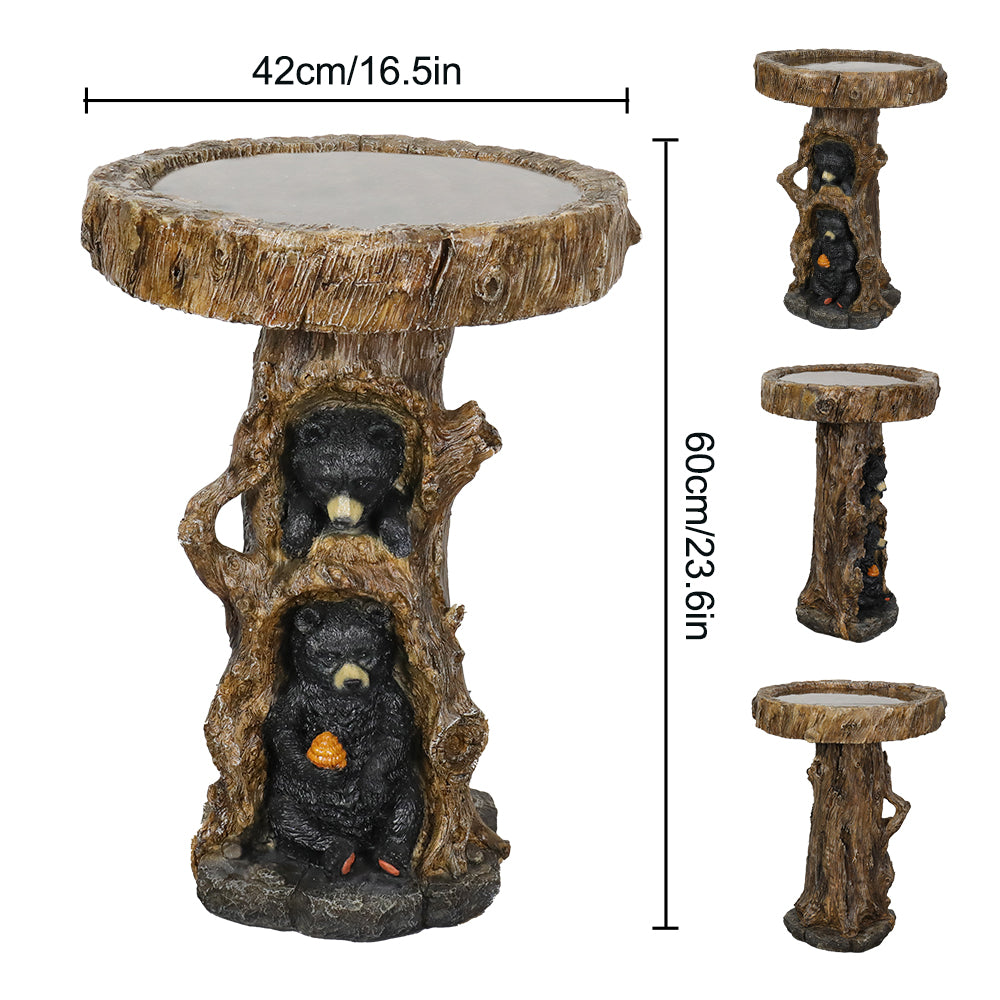 Close-up highlighting the hand-painted finish and durable weatherproof material of the black bear garden statue.