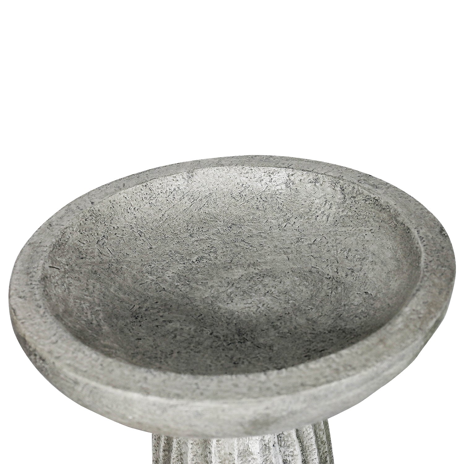 Close-up of fluted concrete bird bath base showing stable wide footing
