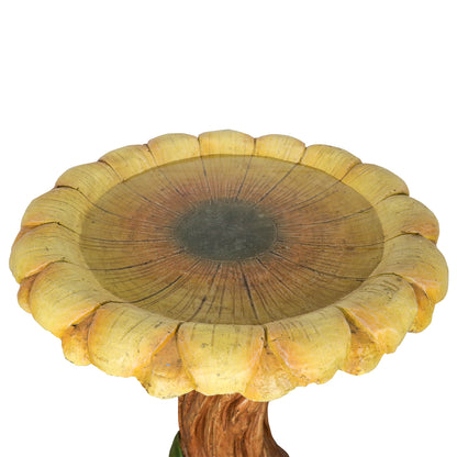 Close-up of the intricately textured sunflower-shaped water bowl designed for bird bathing