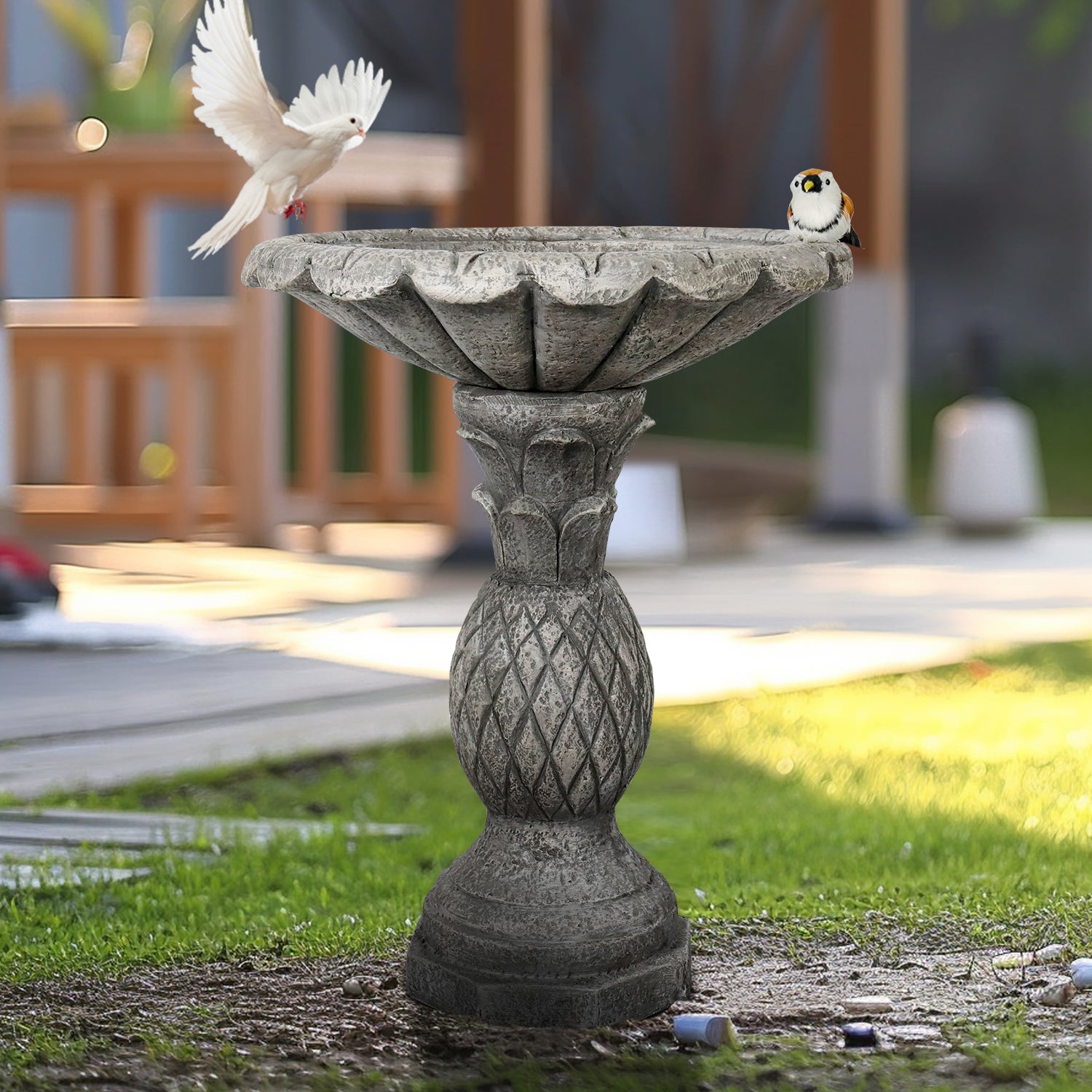 Elegant 24.8"H vintage concrete water feature bringing life and avian melodies to a modern patio.