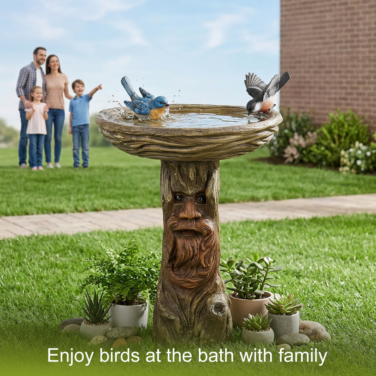 Family enjoying the sight of wild birds visiting the whimsical forest spirit birdbath in their backyard.