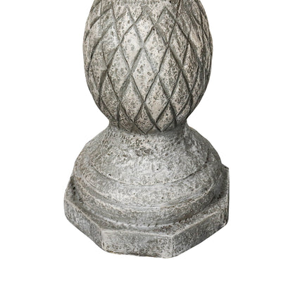 Macro shot of the sturdy and heavy 16.5kg concrete base preventing the birdbath from tipping.
