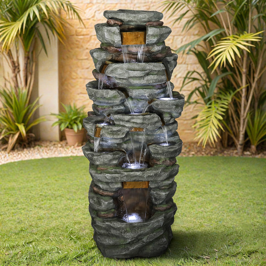 Resin Cliffside Rock Large Outdoor Water Fountain in garden setting