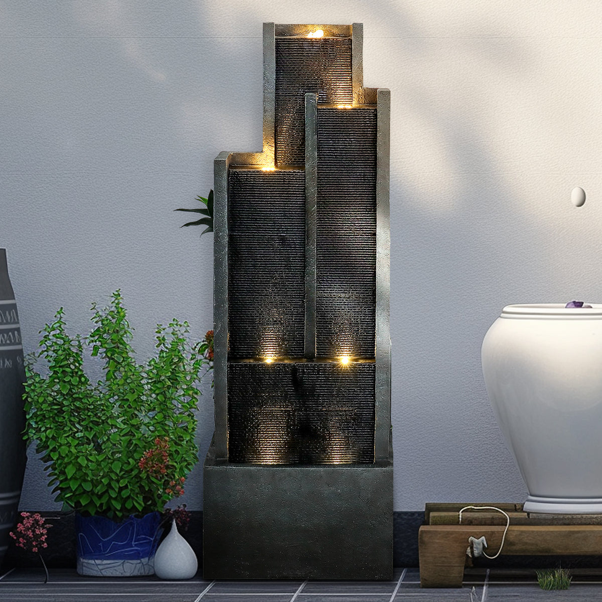 Resin Ribbed Slate Outdoor Water Fountain Quiet 50 in in garden setting