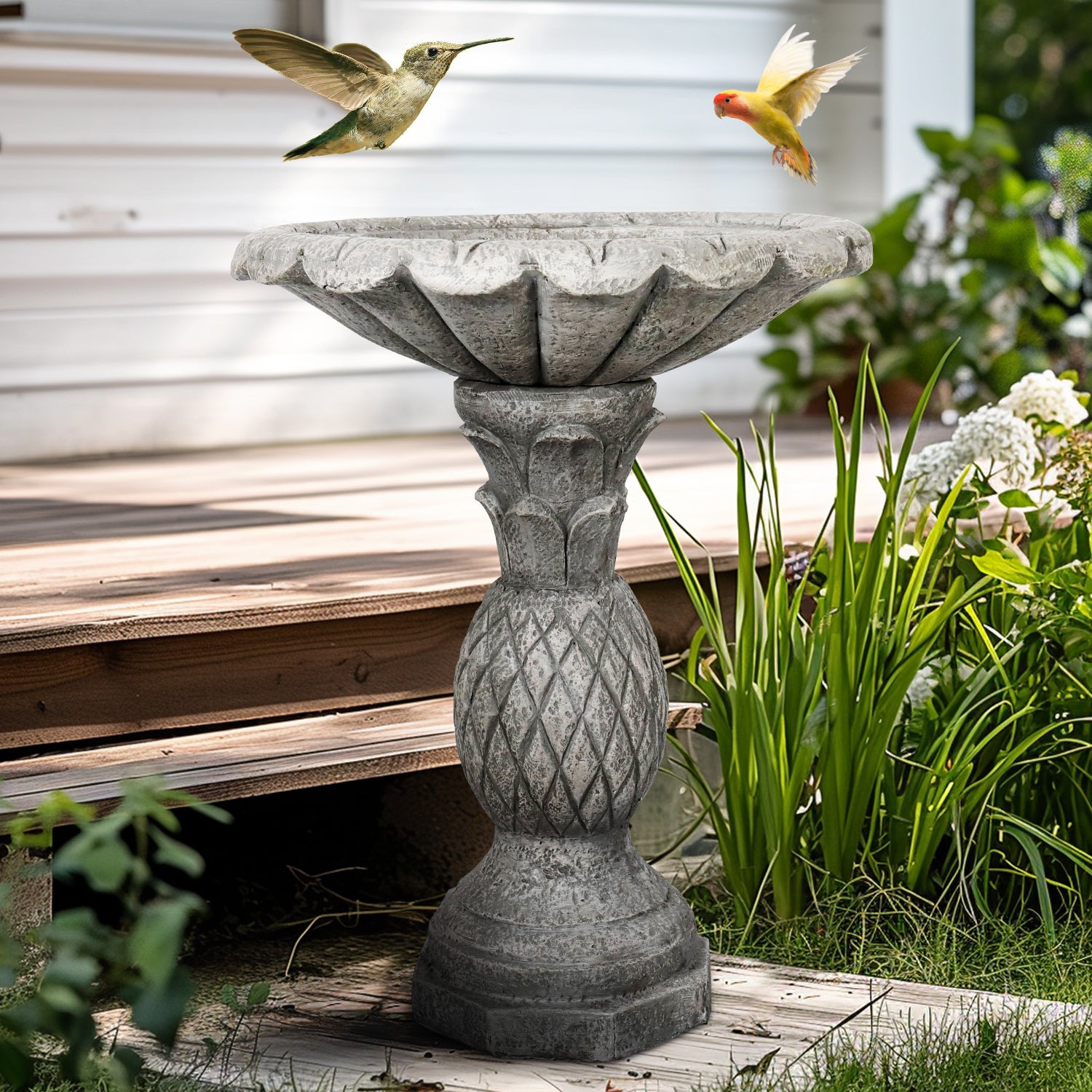 Vintage 24.8"H pineapple texture concrete birdbath serving as a beautiful focal point by a patio steps.