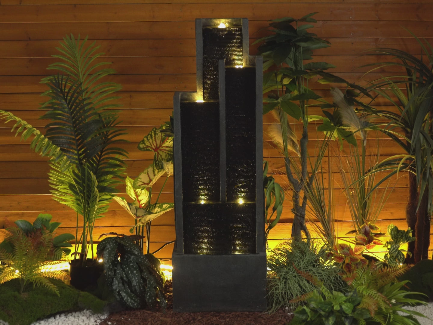Video showcasing the relaxing sound whisper and warm LED lighting of the modern 4-tier fountain.