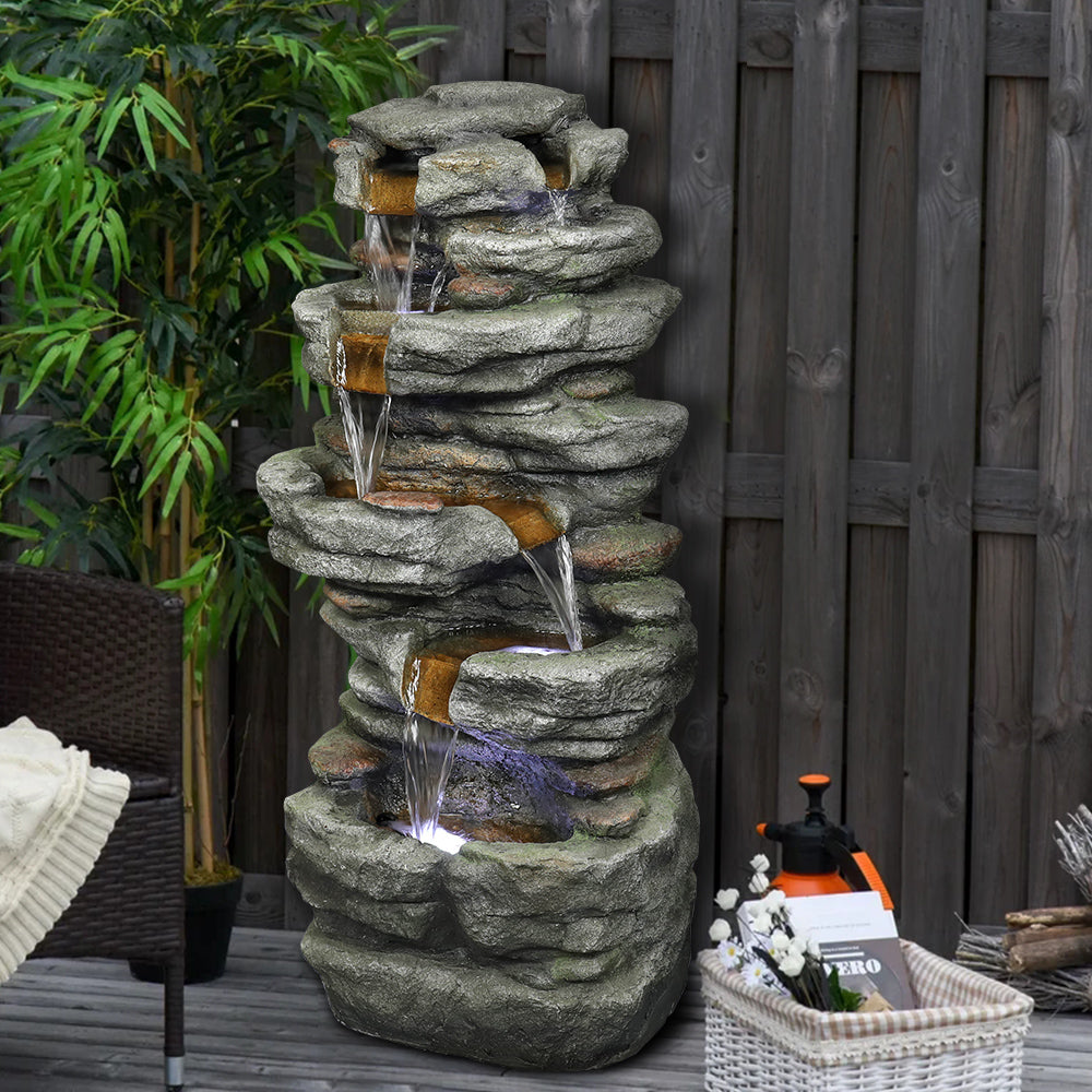Resin Stacked Rock Outdoor Fountain 32 Inch Lit Water in garden setting