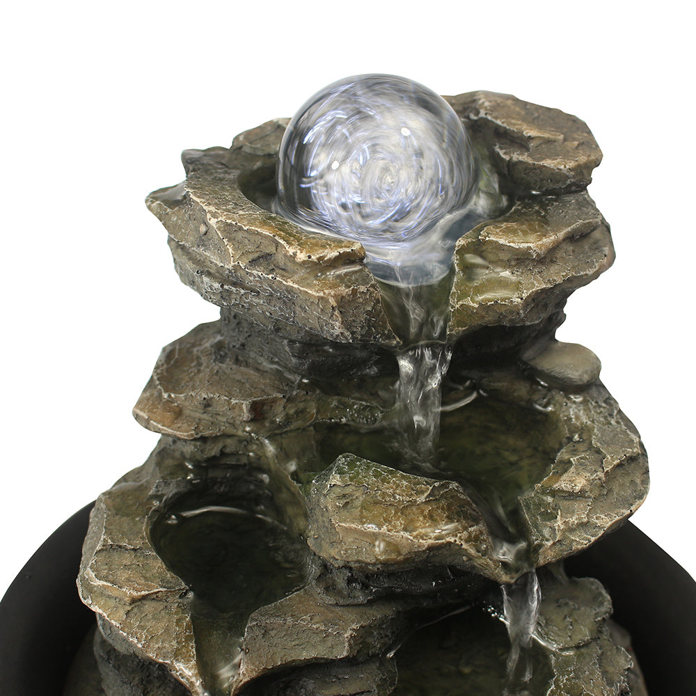 Resin Spinning Orb Tabletop Fountain 8 Inch Color on patio