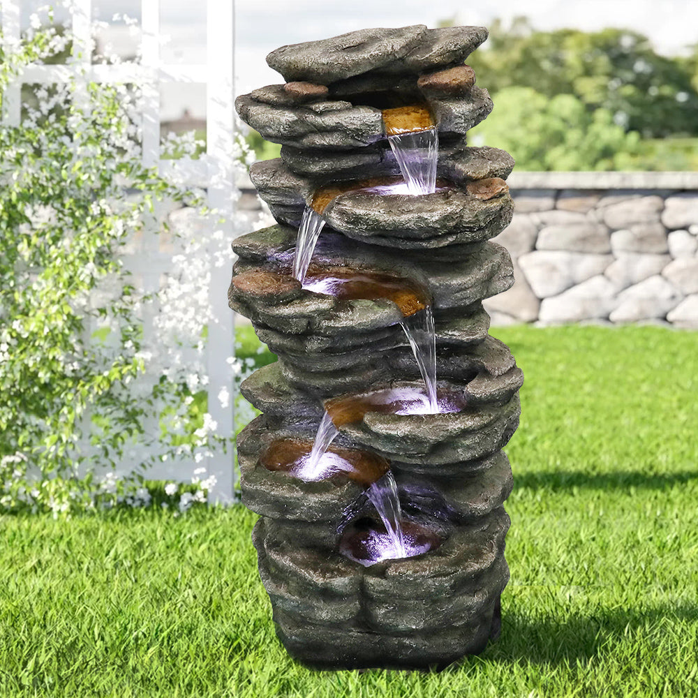 Resin Flagstone Outdoor Water Fountain with Moss 40 in on patio