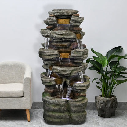 Resin Stepped Shale Outdoor Rock Fountain with Warm in garden setting