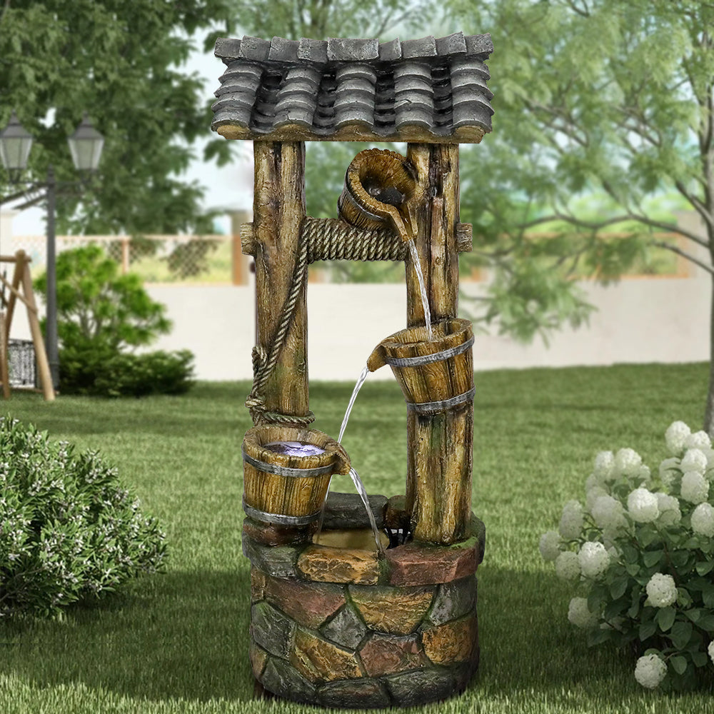 Resin Wishing Well Outdoor Fountain 39 Inch in garden setting